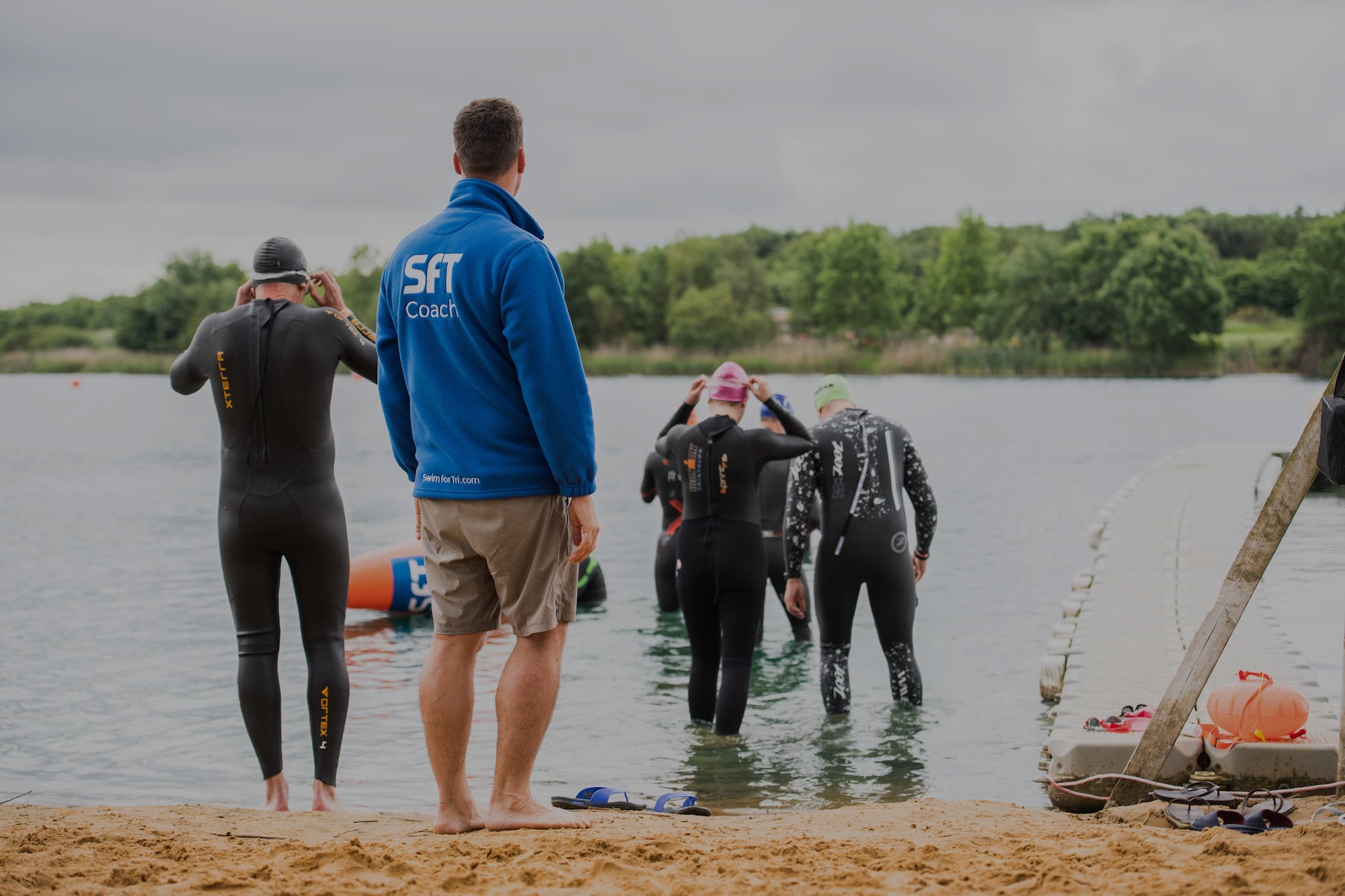 Swim for Tri - Swimmers entering the water at Stubbers Lake Essex